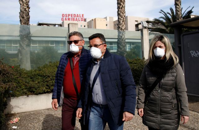Nurses walk outside Garibaldi hospital, as Italy's coronavirus outbreak continues to grow, in Catania